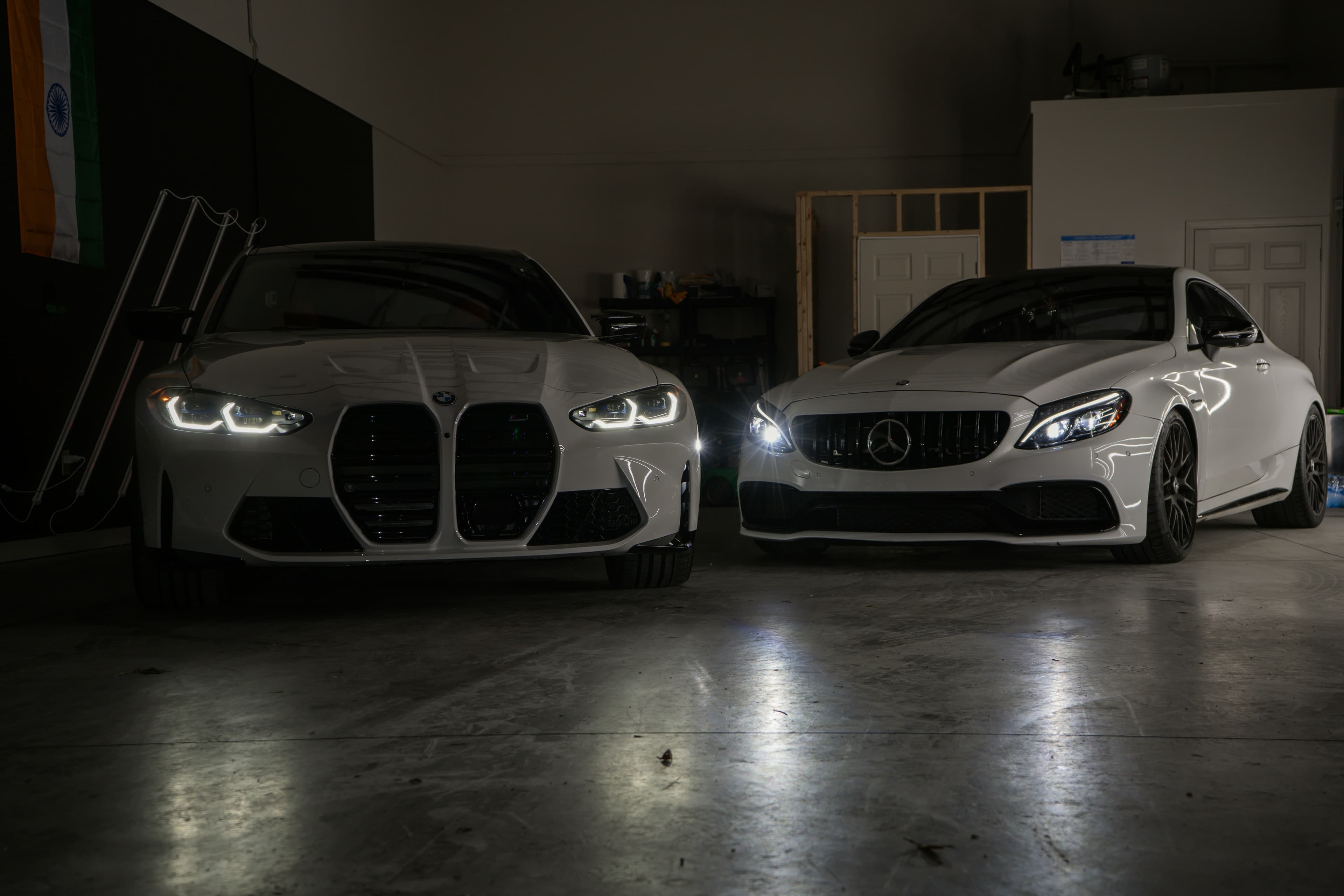 Two freshly detailed vehicles in the studio